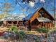Inviting log cabin with a metal roof, showcasing covered porches and natural wood accents at 720 Potneck Rd, Salisbury, NC 28147