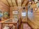 Charming hallway with wooden walls, a display cabinet, and an intriguing collection of taxidermy and art at 720 Potneck Rd, Salisbury, NC 28147