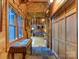 Unique hallway featuring stone archway, wooden details, and a glimpse of the living space at 720 Potneck Rd, Salisbury, NC 28147