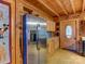 Functional kitchen showcasing stainless steel refrigerator, wood cabinetry and unique decor elements at 720 Potneck Rd, Salisbury, NC 28147