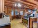 Rustic kitchen with wood accents, stainless steel appliances, and an open dining area at 720 Potneck Rd, Salisbury, NC 28147