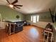 This living room features hardwood floors and a comfortable seating area at 8122 Hutchison Ln, Vale, NC 28168