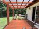 Cozy covered patio with comfortable seating, perfect for enjoying the outdoors in any weather at 8122 Hutchison Ln, Vale, NC 28168