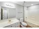 Clean bathroom featuring a vanity with a white sink and a shower-tub combination at 9000 Vagabond Rd, Charlotte, NC 28227