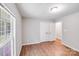 Bedroom featuring neutral colors, hardwood floors, and a spacious closet at 9000 Vagabond Rd, Charlotte, NC 28227