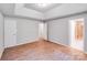 Bedroom with neutral walls, hardwood floors, and access to bath and closet at 9000 Vagabond Rd, Charlotte, NC 28227