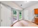 Breakfast nook with views of the back deck and backyard at 9000 Vagabond Rd, Charlotte, NC 28227