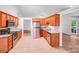 Spacious kitchen with stainless steel appliances and an open view to the living room at 9000 Vagabond Rd, Charlotte, NC 28227
