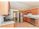 Functional kitchen featuring stainless steel appliances, tile floor, and granite countertops at 9000 Vagabond Rd, Charlotte, NC 28227