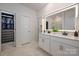 Elegant bathroom features double sinks, quartz countertop, and a walk-in closet at 9529 Cotswood Pl, Gastonia, NC 28056