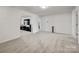 Versatile bonus room with neutral carpet and white walls, adjacent to a Gathering room at 9529 Cotswood Pl, Gastonia, NC 28056