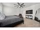 Spacious main bedroom featuring a ceiling fan and ensuite bath at 9529 Cotswood Pl, Gastonia, NC 28056