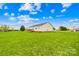 Green, spacious backyard featuring lush grass and a well-maintained wooden deck at 103 Chambwood Ln, Shelby, NC 28152