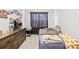 Cozy bedroom with a comfortable bed and natural light from the window at 103 Chambwood Ln, Shelby, NC 28152