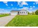 Charming single-story home with lush green lawn and attached two car garage at 103 Chambwood Ln, Shelby, NC 28152