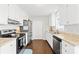 Bright kitchen with stainless steel appliances and ample cabinet space at 103 Chambwood Ln, Shelby, NC 28152