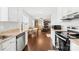 Open kitchen with dining area flowing into a comfortable living space at 103 Chambwood Ln, Shelby, NC 28152