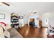 Open-concept living room boasts stylish decor, hardwood floors, and abundant natural light at 103 Chambwood Ln, Shelby, NC 28152