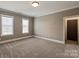 Spacious bedroom with abundant natural light through two large windows and ample floor space at 11008 Strike The Gold Ln, Waxhaw, NC 28173