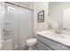 Stylish bathroom featuring a shower-tub combo and a modern vanity with a sleek countertop at 11226 Dappled Light Trl, Charlotte, NC 28227