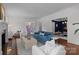 Spacious living room featuring hardwood floors, a fireplace, and an open layout at 117 N Central Ave, Belmont, NC 28012