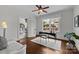 Bright office space with hardwood floors, a large window, and a view to the outside at 117 N Central Ave, Belmont, NC 28012