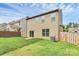 Backyard with patio and sliding glass doors at 1314 San Gabriel Ave, Charlotte, NC 28214
