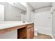 Bathroom featuring vanity and tub/shower combo with tile floors at 1314 San Gabriel Ave, Charlotte, NC 28214