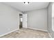 Bedroom featuring neutral paint, carpet, and a doorway at 1314 San Gabriel Ave, Charlotte, NC 28214