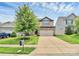 Attractive two-story house with stone accents, a two-car garage, and a green lawn at 1314 San Gabriel Ave, Charlotte, NC 28214