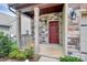 Charming front porch with brick accents and a painted front door, providing a warm welcome to visitors at 1314 San Gabriel Ave, Charlotte, NC 28214