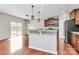 Kitchen with granite countertops, stainless steel appliances and modern pendant lighting at 1314 San Gabriel Ave, Charlotte, NC 28214
