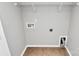 Clean laundry room space equipped with hookups and tile flooring at 1314 San Gabriel Ave, Charlotte, NC 28214