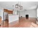Bright and airy open living space with hardwood floors, modern fixtures, stainless steel appliances, and ample natural light at 1314 San Gabriel Ave, Charlotte, NC 28214
