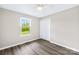 Comfortable bedroom with natural light, spacious closet, and modern ceiling fan at 13715 Mayes Rd, Huntersville, NC 28078