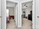 Two bedrooms each featuring a ceiling fan, a desk and good natural light at 14451 San Paolo Ln, Charlotte, NC 28277