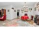 Open dining area with elegant furniture, colorful art and a wine rack, creating a refined atmosphere at 14451 San Paolo Ln, Charlotte, NC 28277