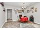 Dining area with neutral walls, colorful art, and a wine rack for a touch of elegance at 14451 San Paolo Ln, Charlotte, NC 28277