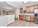 Spacious kitchen with stainless steel appliances and views to the dining area at 14451 San Paolo Ln, Charlotte, NC 28277