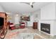 Living room with a fireplace, open to the dining and kitchen areas, perfect for entertaining at 14451 San Paolo Ln, Charlotte, NC 28277