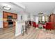 Open concept kitchen and living area with barstool seating and ample space for entertaining at 14451 San Paolo Ln, Charlotte, NC 28277