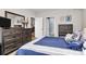 Comfortable main bedroom with an en-suite bathroom and dark wood furniture at 14451 San Paolo Ln, Charlotte, NC 28277