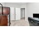 Another view of home office, showing ample closet space and neutral carpeting at 14451 San Paolo Ln, Charlotte, NC 28277