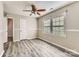 Bedroom with wood-look flooring, natural light, and a closet space at 1506 Union New Hope Rd, Gastonia, NC 28056