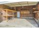 Spacious two-car garage with ample storage shelves and a well-lit interior at 1506 Union New Hope Rd, Gastonia, NC 28056