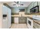 Functional kitchen with tile backsplash, ample cabinet space, and modern appliances at 1506 Union New Hope Rd, Gastonia, NC 28056