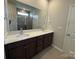 Bathroom with double sink vanity and a large mirror at 156 Ella Claire Dr, York, SC 29745