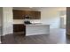 Modern kitchen with stainless steel appliances and a large center island at 156 Ella Claire Dr, York, SC 29745
