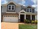Charming two-story home with a brick and gray siding exterior and a two-car garage at 160 Ella Claire Dr, York, SC 29745