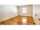 Bedroom with hardwood floors and white walls at 1658 Buckingham Ave, Gastonia, NC 28054